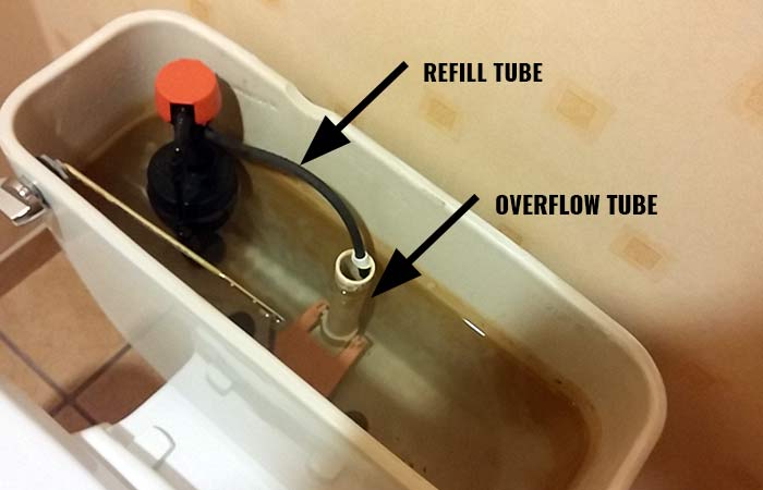 A photo of toilet overflow tube in tank