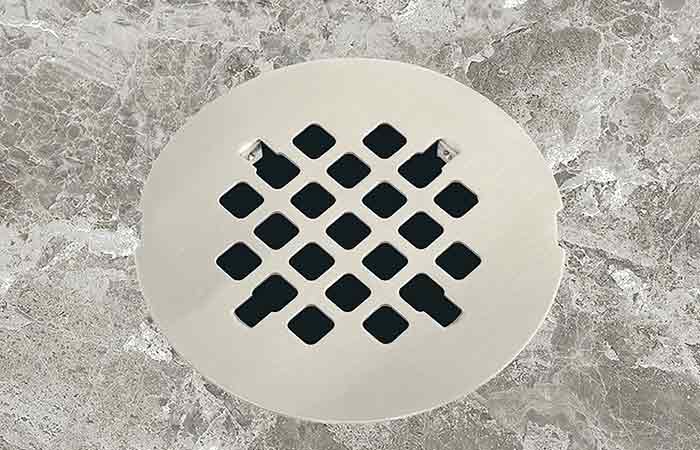 Snap in shower drain cover